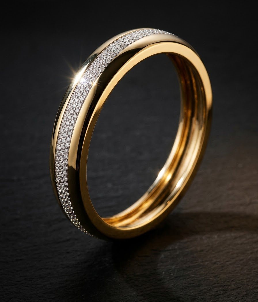 Polished yellow-gold kada bangle with a band of pavé diamonds